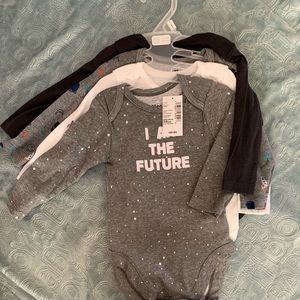 A set of four onesies